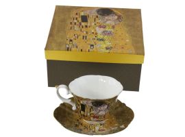 Cup with saucer "The Kiss" on a gold background
