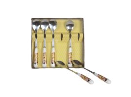 Set of teaspoons "The Kiss" series on a gold background