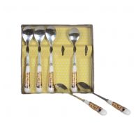 Set of teaspoons "The Kiss" series on a gold background