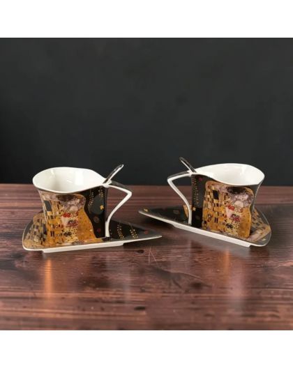 Set of two gift cups with saucers and spoons – The Kiss in black and gold – 180 ml