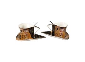 Set of two gift cups with saucers and spoons – The Kiss in black and gold – 180 ml