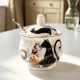 Sugar bowl with spoon, Cat's tenderness