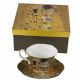 Cup with saucer "The Kiss" on a gold background