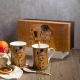Set of two cups with spoon "The Kiss"