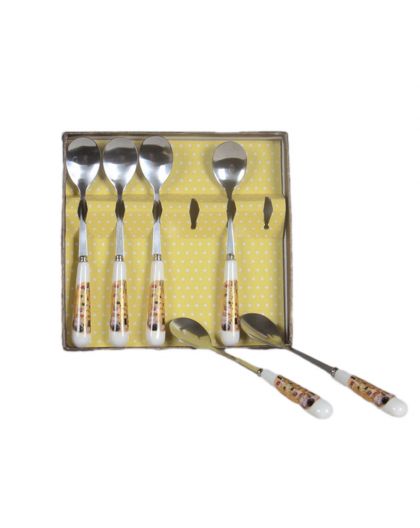 Set of teaspoons "The Kiss" series on a gold background